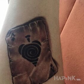 Tattoo Ace up your sleeve on the forearm motif: objects