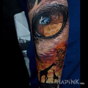 Tattoo Africa on the forearm motif: animals style: realistic