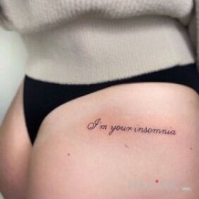 Tattoo Beautiful inscription on the buttocks motif: lettering style: calligraphy