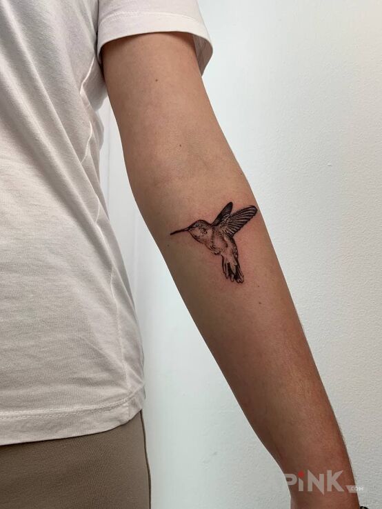 Tattoo Kolibri ( microrealizm) in animals motif and realistic style on the forearm