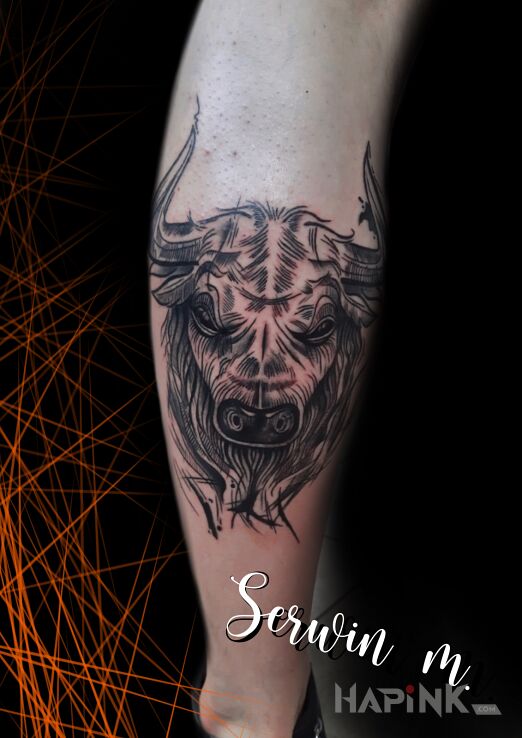 Tattoo Byk in zodiac signs motif and graphic / illustrative style on the leg