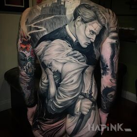 Tattoo Phantom of the Opera on the back motif: characters style: realistic