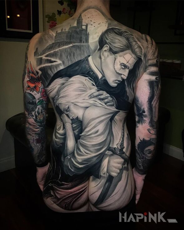 Tattoo Upiór w operze in characters motif and realistic style on the shoulder blades