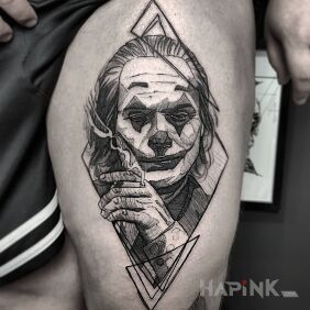 Tattoo Grey Joker on the thigh motif: black and gray style: sketch