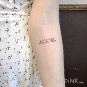 Tattoo The warmest color on the forearm motif: lettering