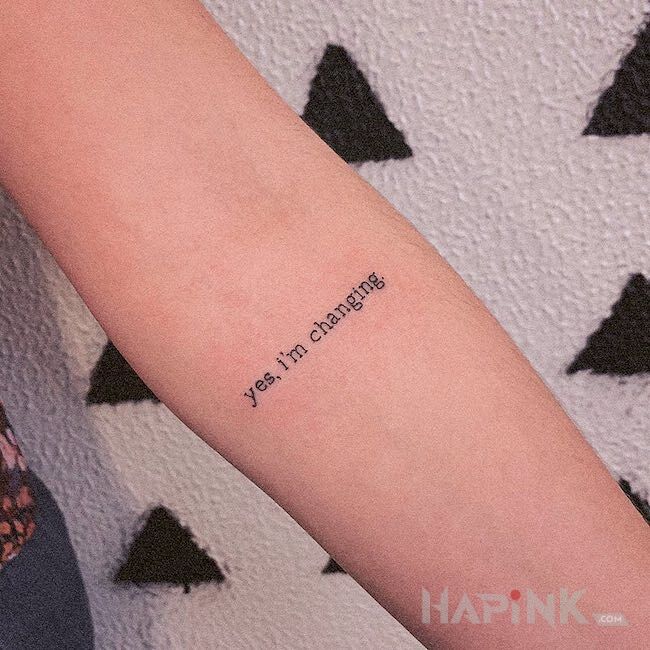 Tattoo Ciągłe zmiany in lettering motif On the arm