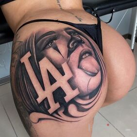 Tattoo Chick from LA on the buttocks motif: faces style: realistic