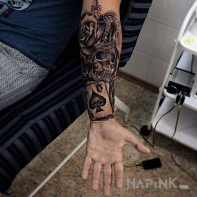 Tattoo Calf tattoo on the forearm motif: skulls style: realistic