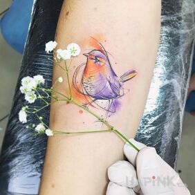 Tattoo Little Bird on the forearm motif: animals style: Watercolor