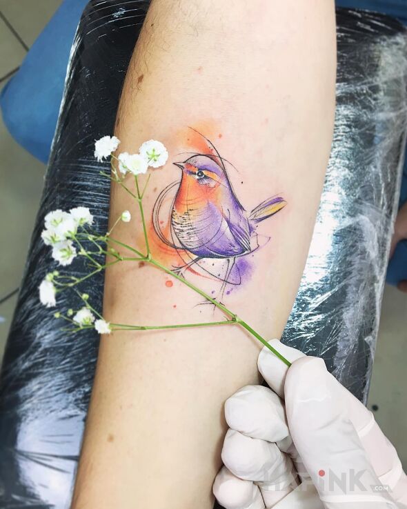 Tattoo Ptaszeczek in colorful motif and graphic / illustrative style On the arm