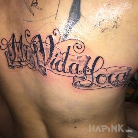 Tattoo Mi vida loca on the back motif: lettering