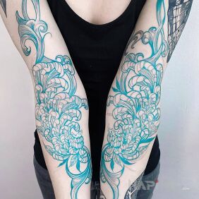 Tattoo What colors! on the forearm motif: colorful style: graphic / illustrative