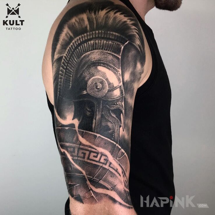 Tattoo GLADIATOR in war motif and realistic style on the upper arm