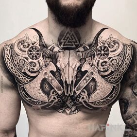 Tattoo Two axes on the collarbone motif: black and gray style: Celtic / Nordic