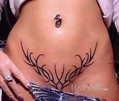 Tattoo Kosa in sexy motif and tribal style intimate
