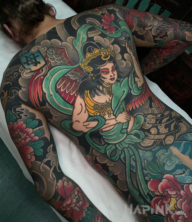 Tattoo Japonia wita in characters motif and japanese / irezumi style on the back