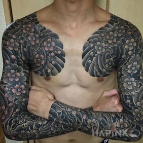 Tattoo A lot of cherry blossoms on the upper arm motif: flowers style: japanese / irezumi