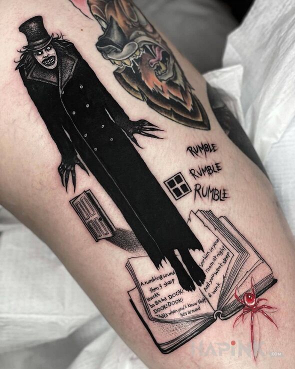 Tattoo Koszmarny człek in dark motif and blackwork / blackout style on the leg