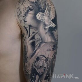 Tattoo Thoughtful woman On the arm motif: black and gray style: realistic