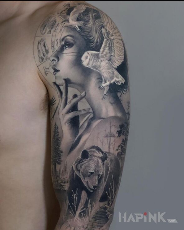 Tattoo Zamyślona kobieta in black and gray motif and realistic style On the arm