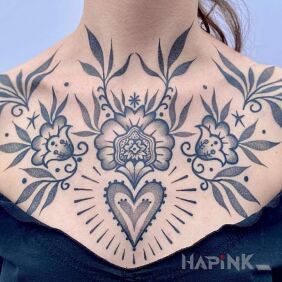 Tattoo Folklor accents on the collarbone motif: flowers style: graphic / illustrative