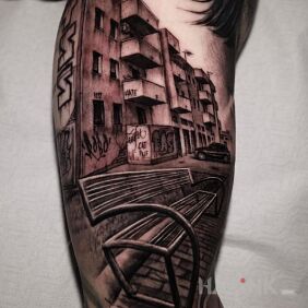 Tattoo Bench on the bicep motif: black and gray style: realistic