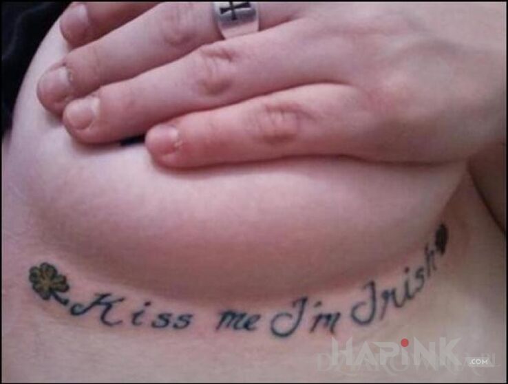 Tattoo Xd in sexy motif on the breast