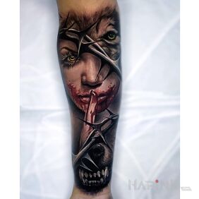 Tattoo Werewolf on the forearm motif: characters style: realistic
