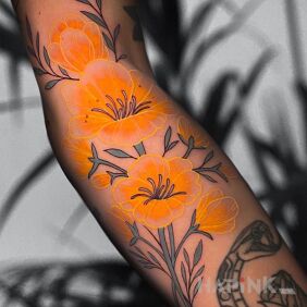 Tattoo Beautiful yellow flowers on the forearm motif: flowers style: graphic / illustrative
