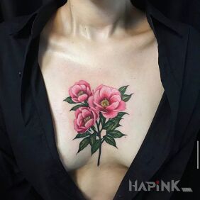 Tattoo 3 colorful flowers on the chest motif: floral style: realistic