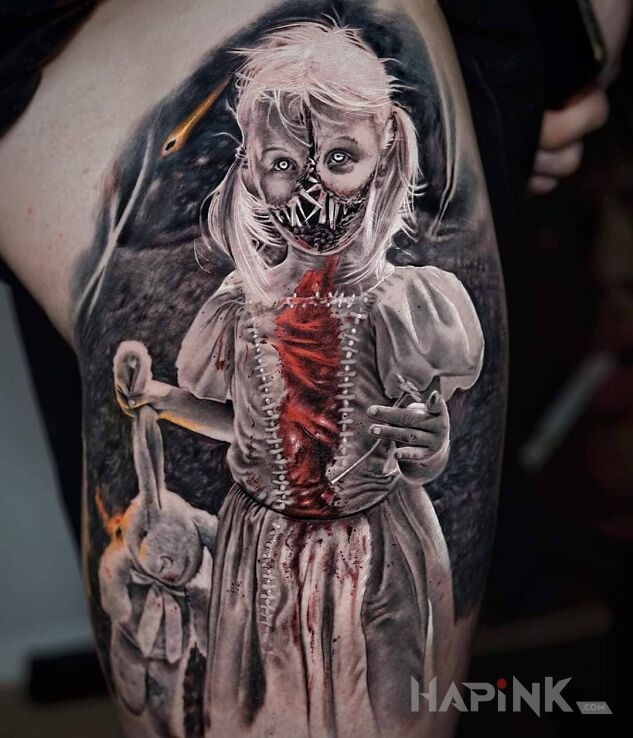 Tattoo Dziewczynka chce się pobawić in dark motif and realistic style on the thigh