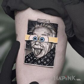 Tattoo Albert Einstein 😅 on the bicep motif: black and gray style: cartoon / comic book