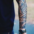 Wycena tatuażu - Wycena tatuażu polinezyjskiego rękawa / czarnego lasu