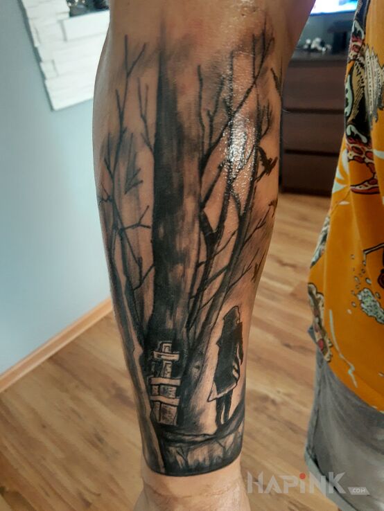 Tattoo Upiorny las in dark motif and graphic / illustrative style On the arm