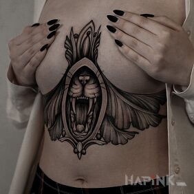 Tattoo Tiger's muzzle on the stomach motif: animals style: graphic / illustrative