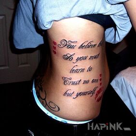Tattoo Something about trust on the ribs motif: lettering