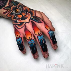 Tattoo Candles in intense colors on the hand motif: colorful style: newschool