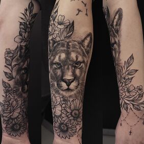 Tattoo Floral puma full on the forearm motif: floral style: realistic