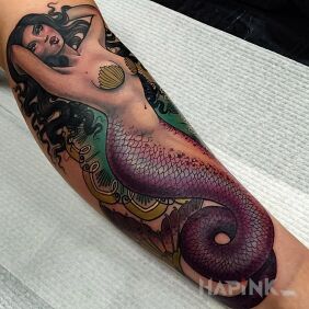 Tattoo Siren on the forearm motif: characters