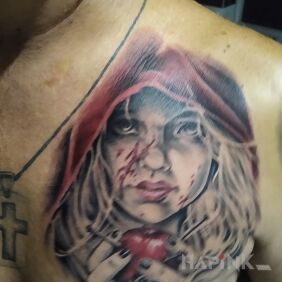 Tattoo Girl with an apple on the chest motif: faces style: realistic