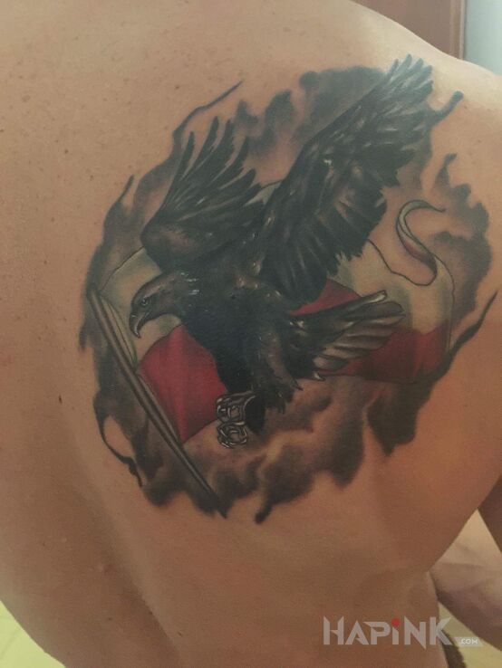 Tattoo Tatuaż patriotyczny in patriotic motif on the shoulder blades