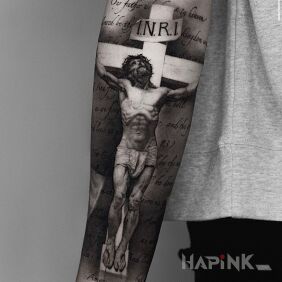 Tattoo Crucified Jesus On the arm motif: religious style: realistic