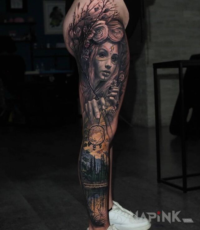 Tattoo Czary mary nad jeziorem in legsleeves motif and realistic style on the calf