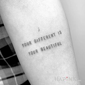 Tattoo Your difference On the arm motif: lettering