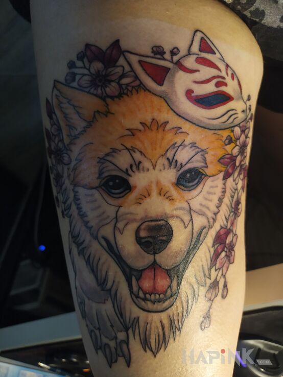 Tattoo Akita inu / kitsune in animals motif and graphic / illustrative style on the thigh