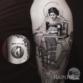 Tattoo Spinner on the upper arm motif: black and gray style: graphic / illustrative