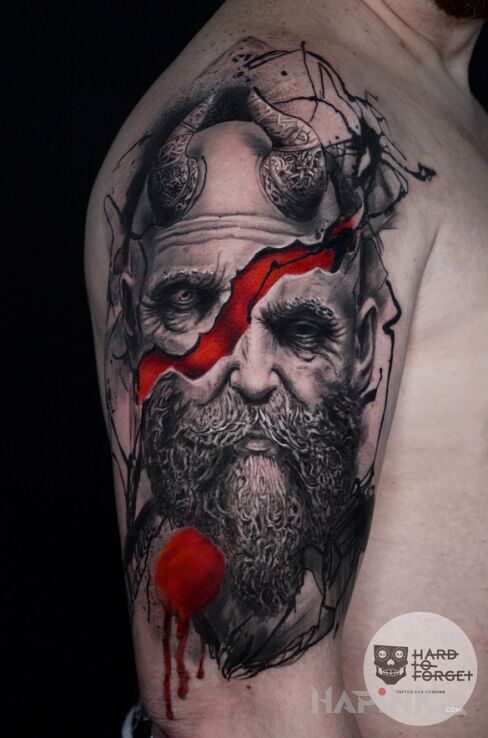 Tattoo Nordyckie bóstwo in dark motif and realistic style on the upper arm