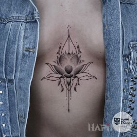 Tattoo Lotus on the stomach motif: flowers style: contour / linework
