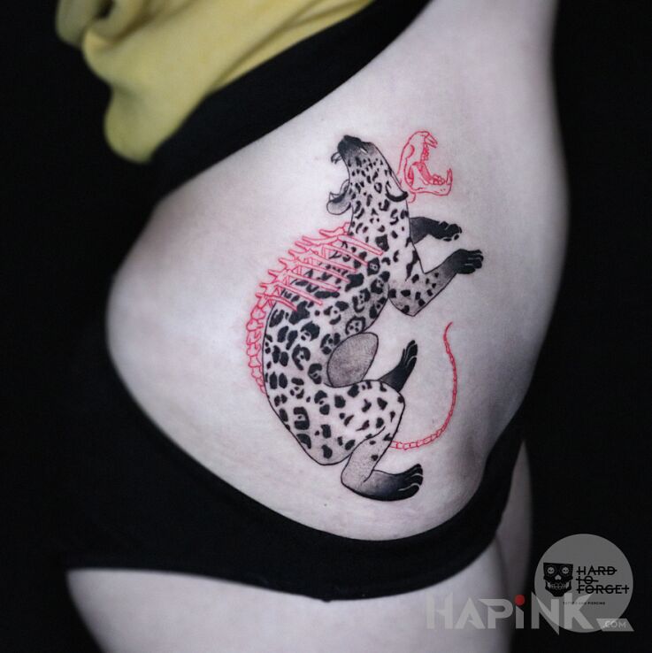 Tattoo Lampart in black and gray motif and graphic / illustrative style on the stomach