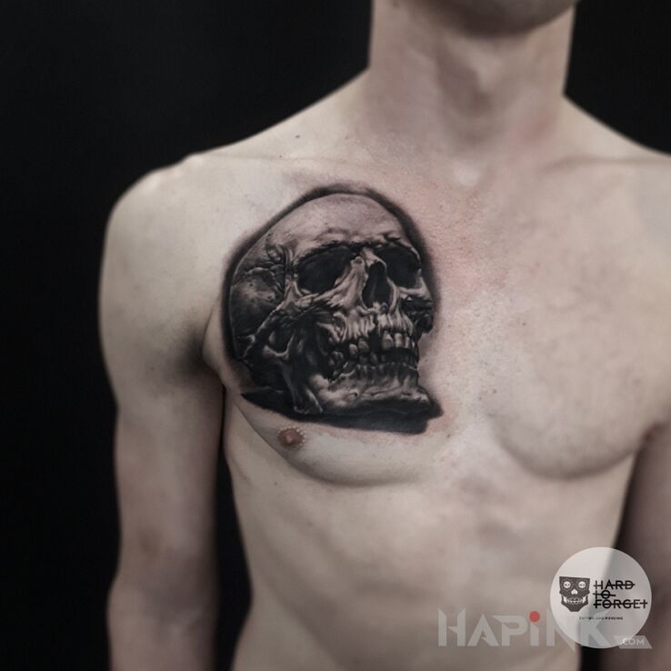 Tattoo Czaszka in black and gray motif and realistic style on the chest